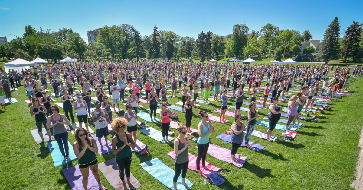Yoga rocks the park in Denver at Sunken Gardens Park